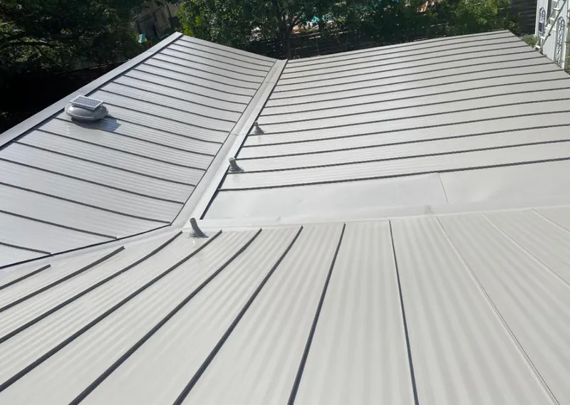 Solar attic fan installed on a metal roof for Roof Ventilation in Santa Paula